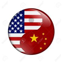USA and China working together, The US flag and Chinese flag on a yin yang symbol isolated over white